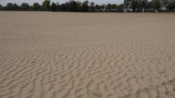 Sandüberdeckung auf landwirtschaftlicher Fläche